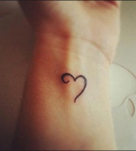 black heart tattoo  simple on wrist