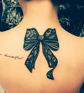 bow tattoos back