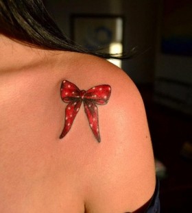 bow tattoos by luis miguel