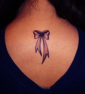 bow tattoos upper back