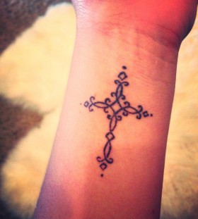 cross tattoo wrist