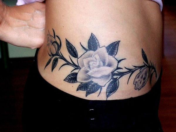 hip tattoo for girl dark rose