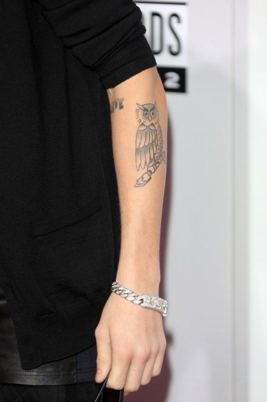 justin bieber tattoo first tattoos