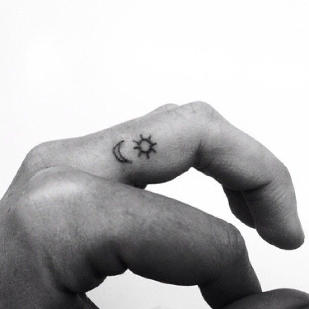 moon tattoo on finger