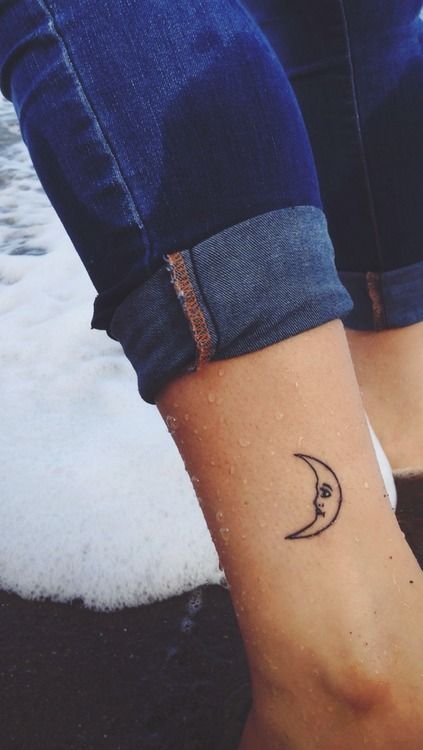 moon tattoo with face