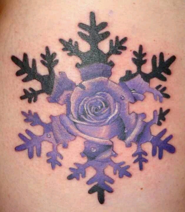 small purple snowflake tattoo