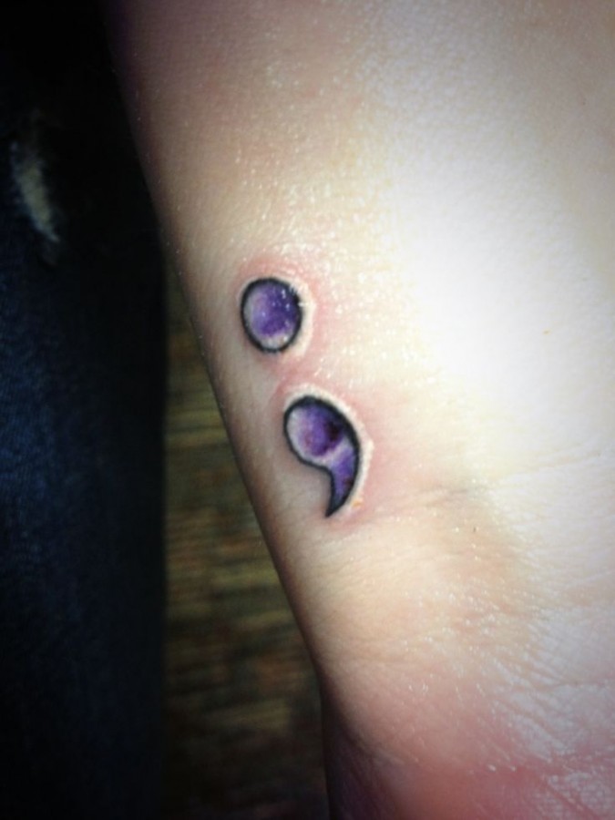 small purple tattoo points