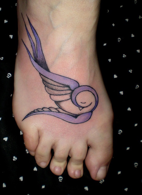 small purple tattoo  sleeping wing