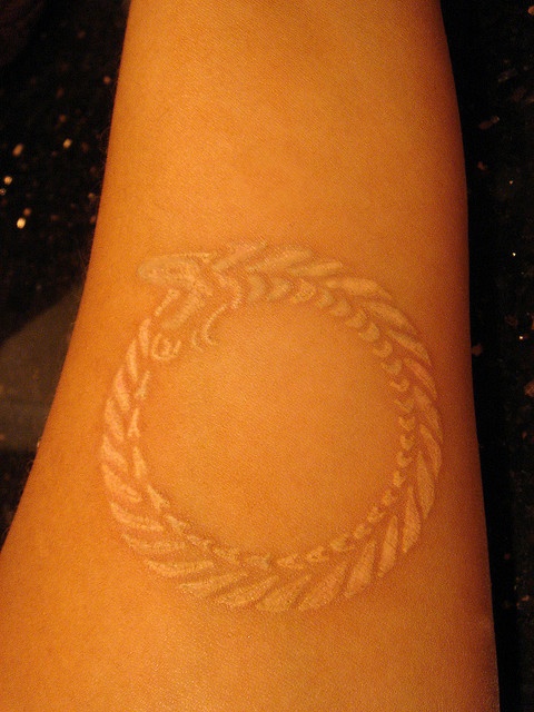 white ink  snake tattoo