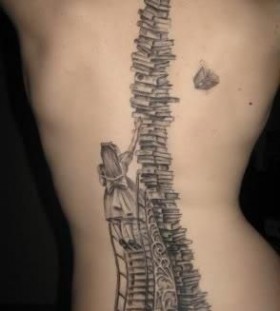 Amazing books tower tattoo