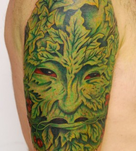 Amazing green face tattoo