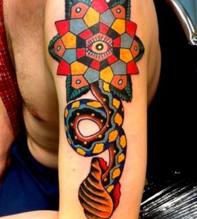 Awesome shoulder tattoo by Robert Ryan