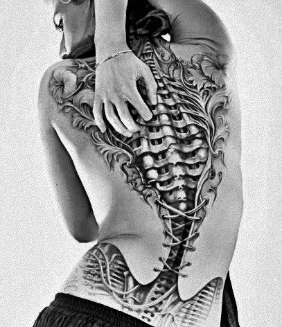 Black and white corset tattoo