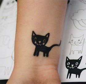 Black cat tattoo