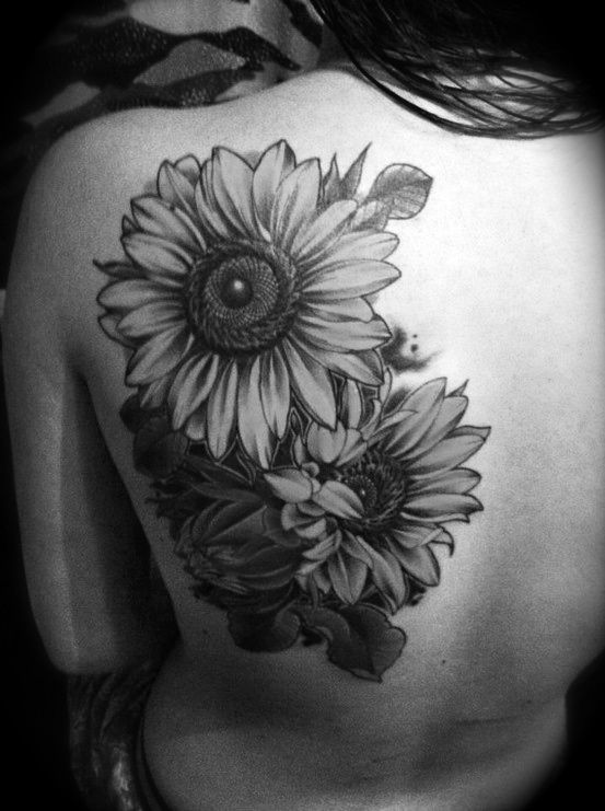 Black sunflower tattoo