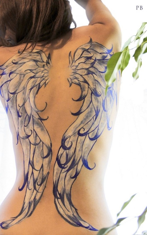 Blue and white wings tattoo