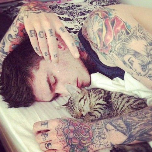 Cat and man tattoo