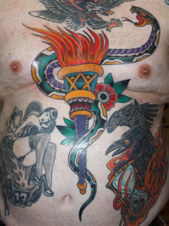 Chest tattoo by Mike Schweigert