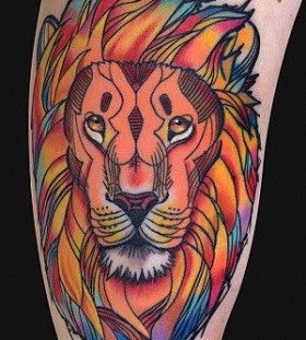 Colorful lion tattoo by Art Junkies