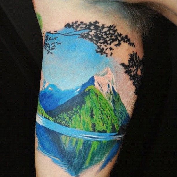 Colorful mountains tattoo