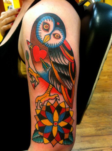 Colorful owl tattoo by Robert Ryan