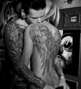Couple wings tattoo