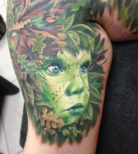 Cute green face tattoo