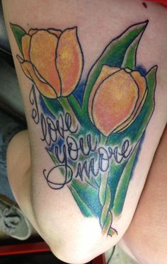 Cute orange tulips tattoo