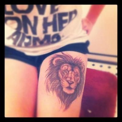 Cute tattoo with lion head