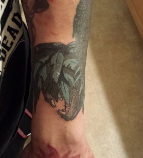 Dinosaur tattoo by Lisa Orth