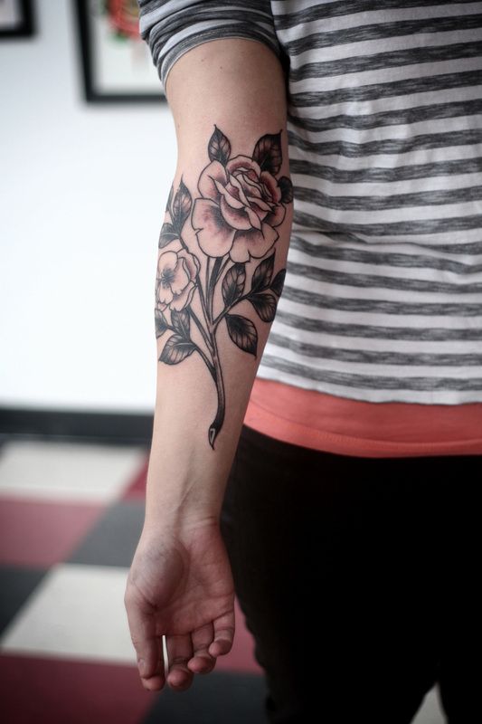 Flower tattoo by Alice Carrier