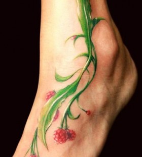 Foot plant tattoo