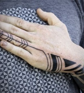 Hand black tattoo