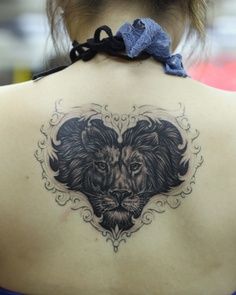 Heart lion tattoo