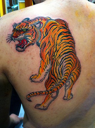 Lion tattoo by Robert Ryan