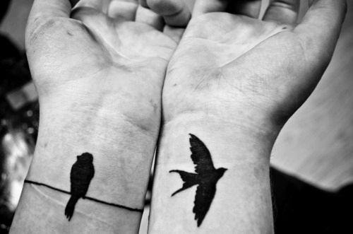 Lovely birds tattoo