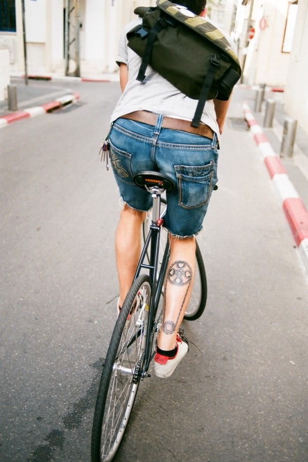 Man bike tattoo