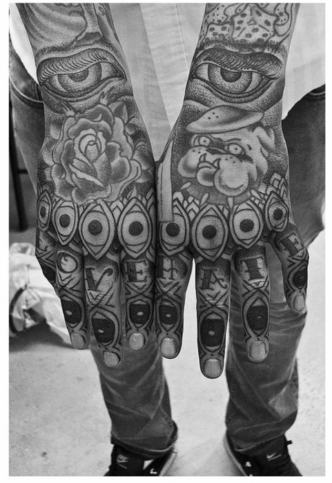 Man fingers tattoo