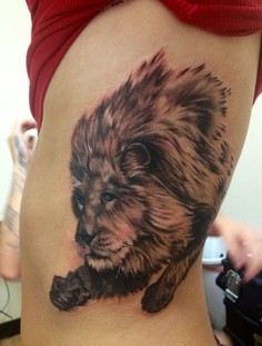 Old lion tattoo