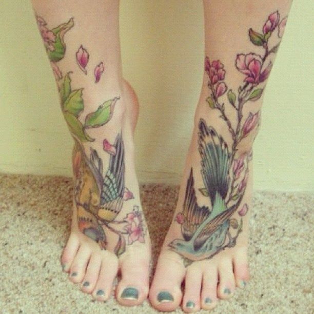 Ornaments on leg tattoo