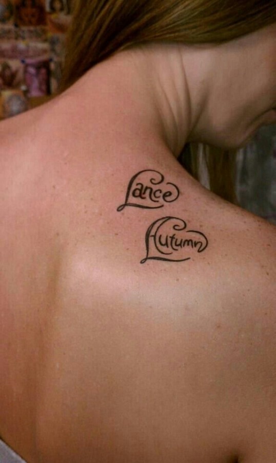 Shoulder names tattoo