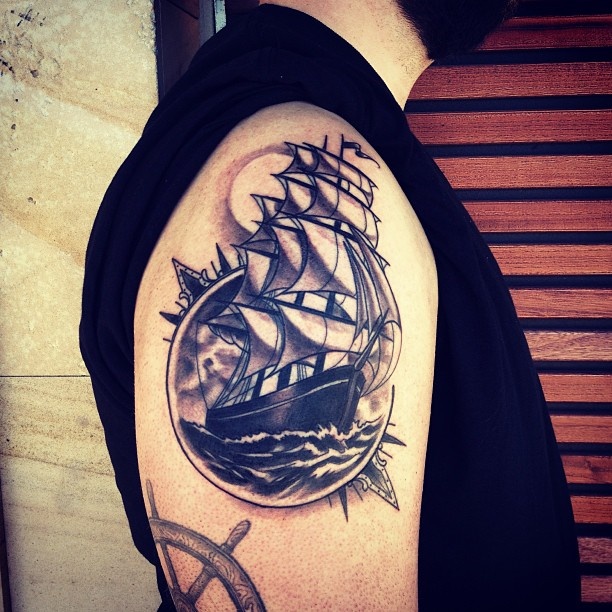 Shoulder ship tattoo