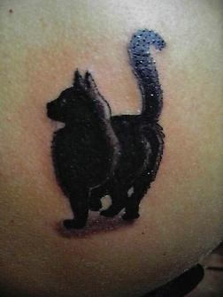 Simple black cat tattoo