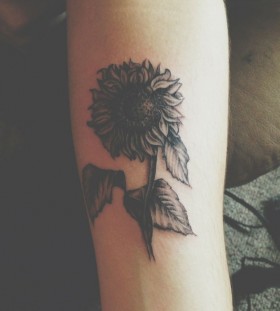 Simple black sunflower tattoo