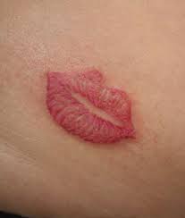 Simply red lips tattoo