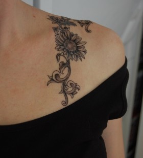 Small pretty sunflower tattoo