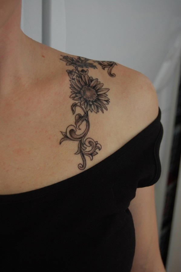 Small pretty sunflower tattoo