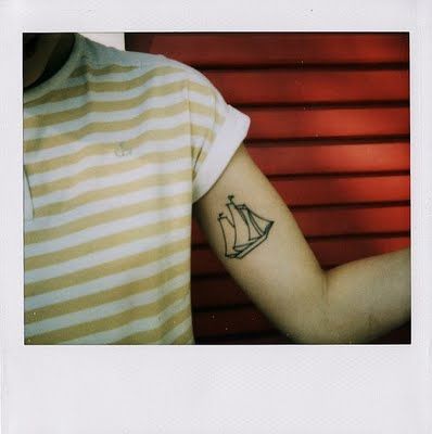 Small ship tattoo