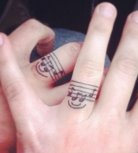 Smile-and-fingers-music-tattoo