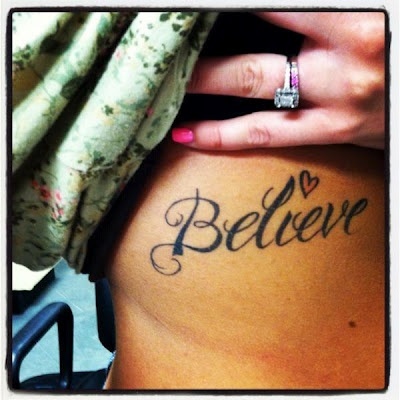 Woman body believe tattoo